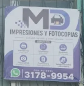 Rótulo de MD Impresiones y Fotocopias con su logo y WhatsApp 3178-9954
